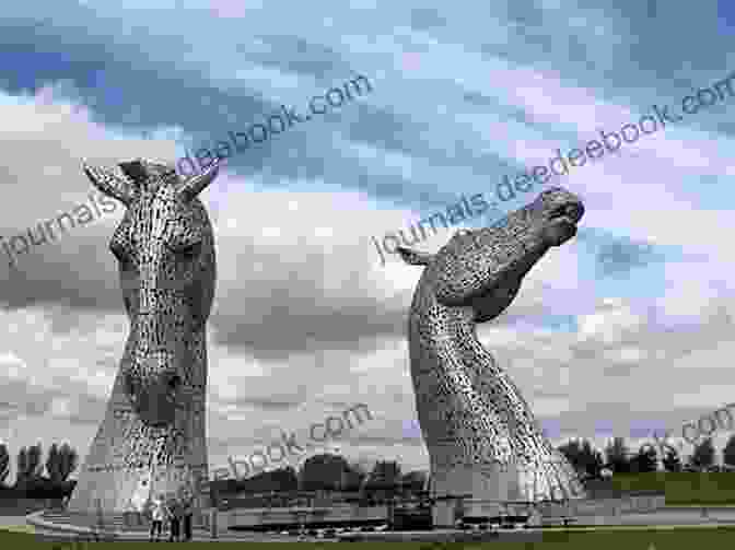 A Panoramic View Of The Majestic Kelpies Sculptures Against A Vibrant Sunset Sky. The Desperate Journey (Classic Kelpies)