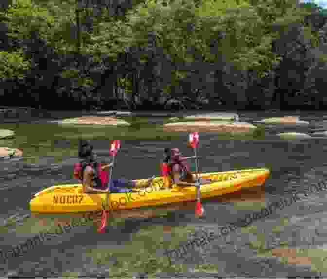 Adrenaline Seekers Kayaking On The Chattahoochee River, Against The Backdrop Of Atlanta's Skyline Playing The Field (Hot Lanta 2)