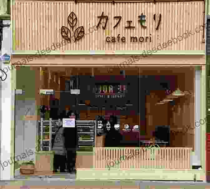 Exterior Of Mori Tokyo Cafe, Featuring A Glass Facade And Lush Greenery Mori Tokyo Cafe Alan Brown